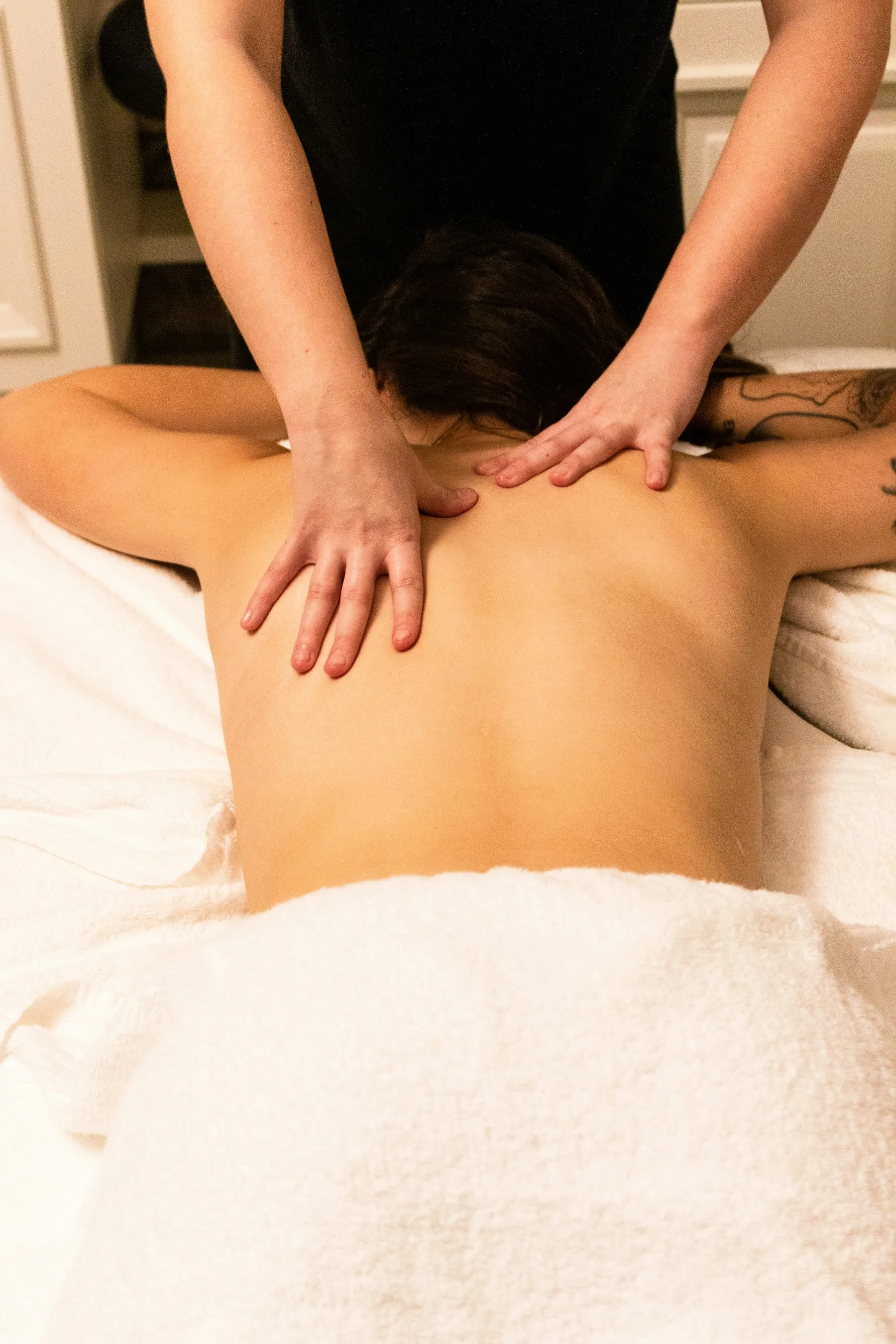 A back massage in progress